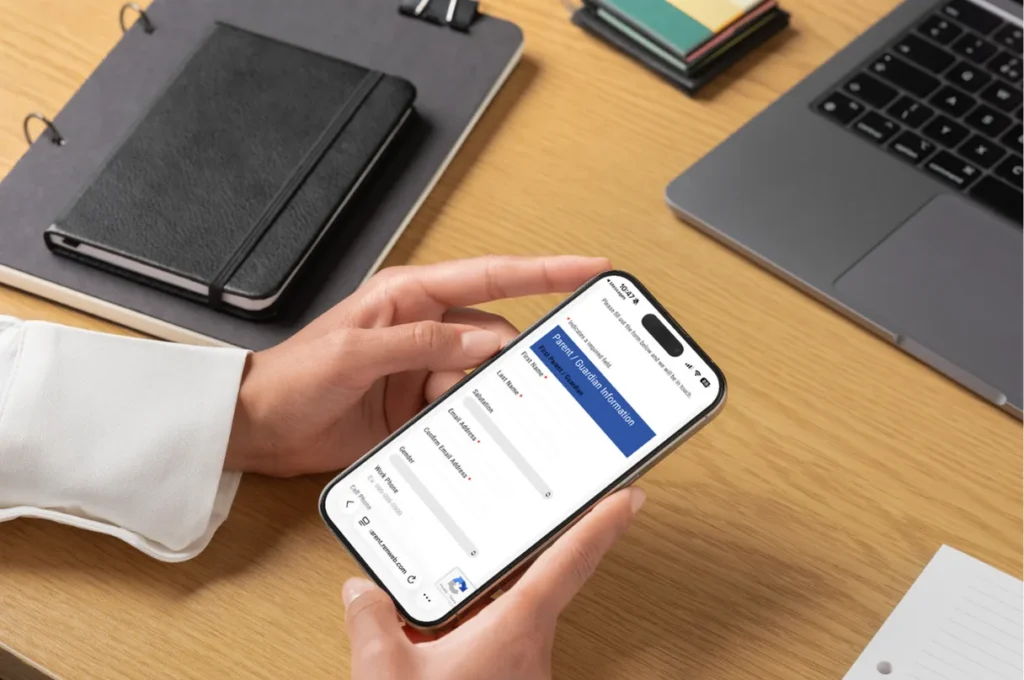 User filling out a school inquiry form on their smartphone